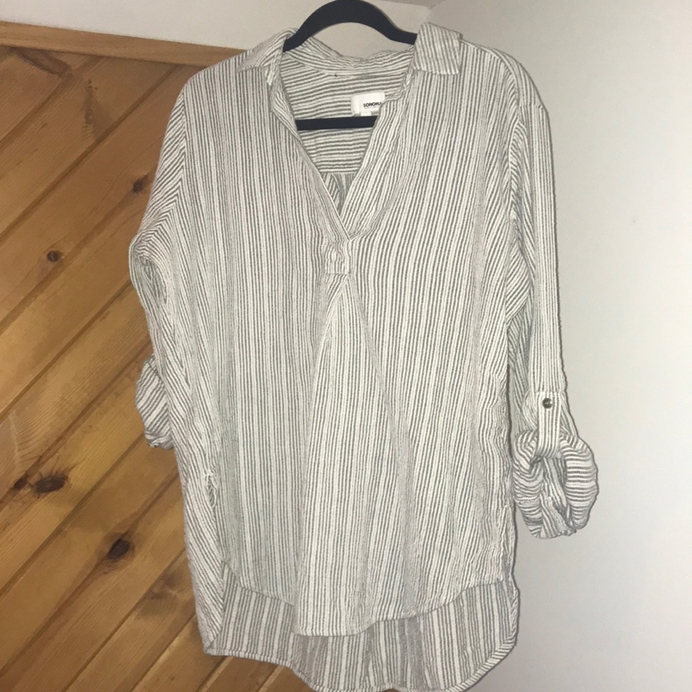 Like new black and white striped womens top. Size large